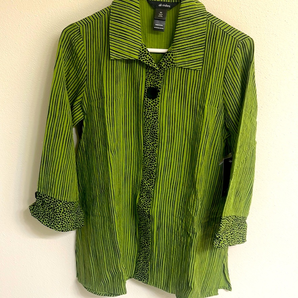 Women’s beautiful top by Ali Miles.